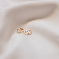 14K Huggies from Erin Fader Jewelry