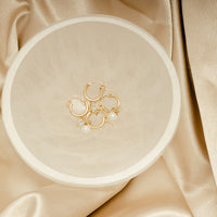 The Monroe Huggie Hoops by Erin Fader Jewelry
