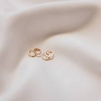 14k Gold Mini Hinged Hoops from Erin Fader Jewelry