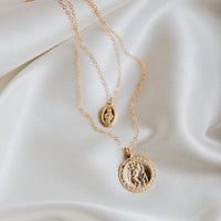 Tiny Oval Mary Medallion Necklace from Erin Fader Jewelry